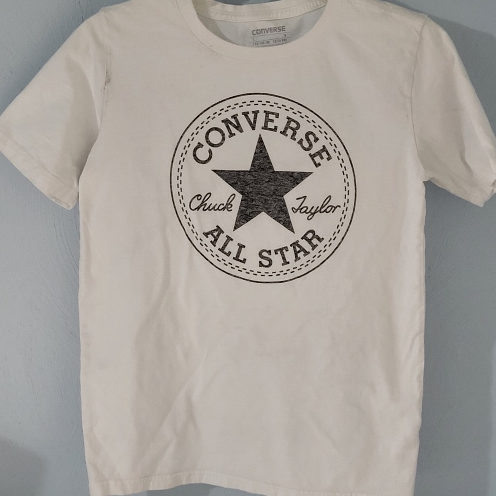 The brand is Converse, the size is (12-13 yrs)